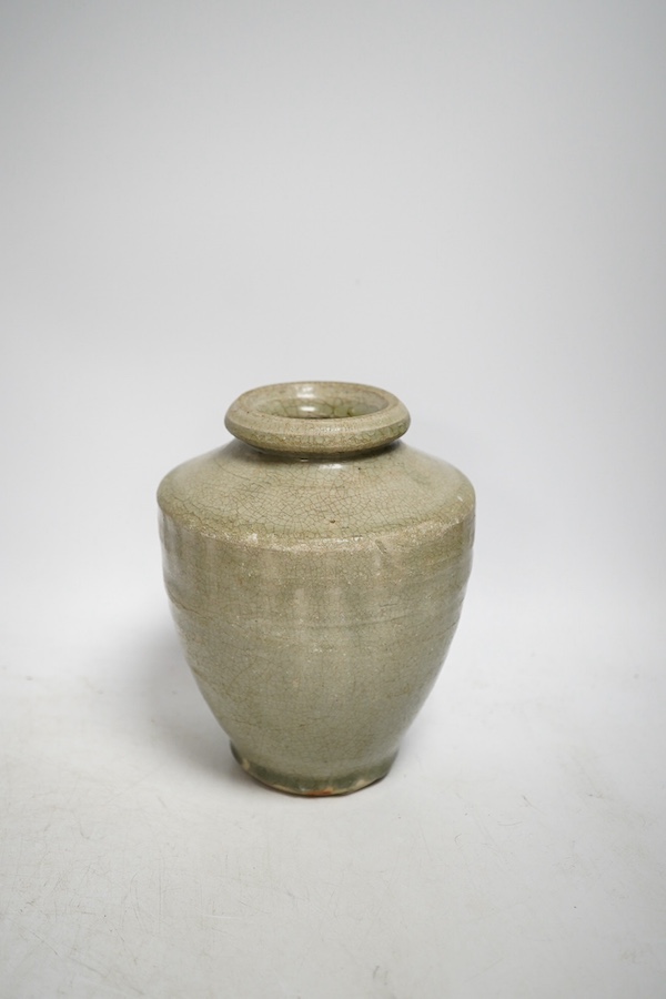 A Chinese celadon vase, 16cm high. Condition - fair to good